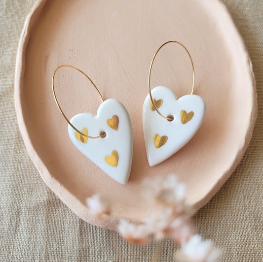 Porcelain dangle earrings with gold "Hearts with hearts"