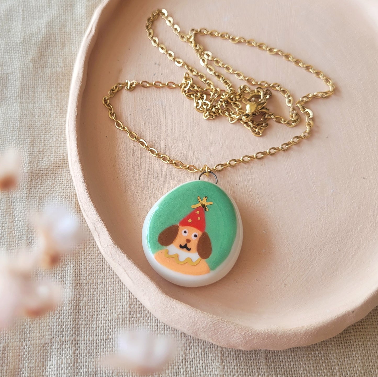 Porcelain necklace with gold "Party boy"