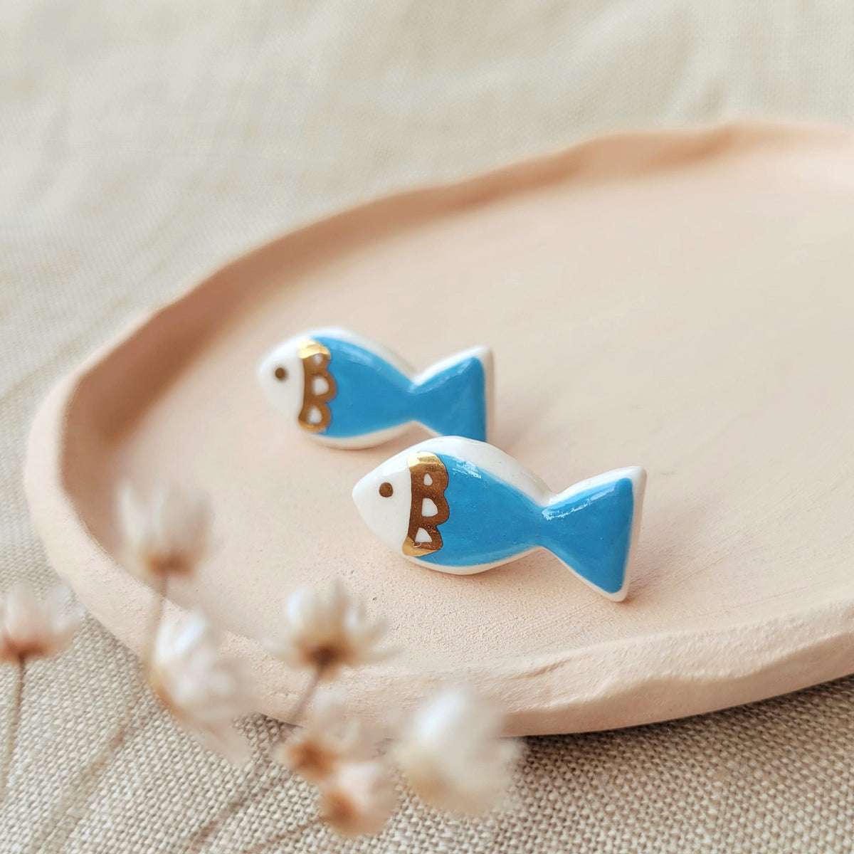 Porcelain stud earrings with gold " Blue fish"