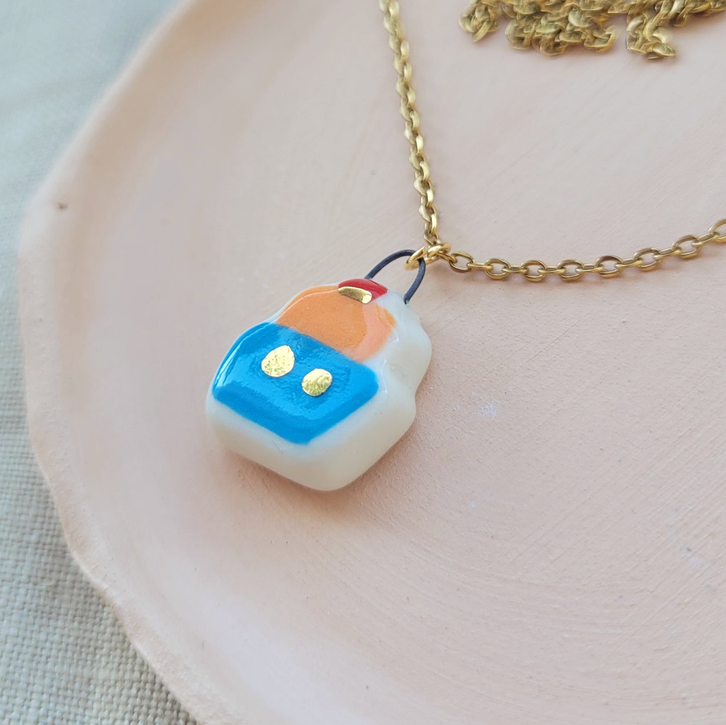Porcelain necklace with gold "Little boat"