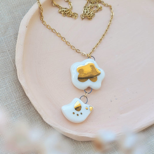 Porcelain necklace with gold "White bird"