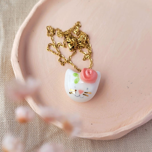 Porcelain necklace with gold "Kitty with pink flower"