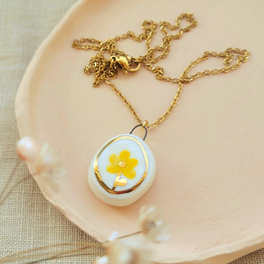 Porcelain necklace with gold "Yellow flower"