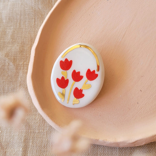 Porcelain brooch with gold "Red tulips"