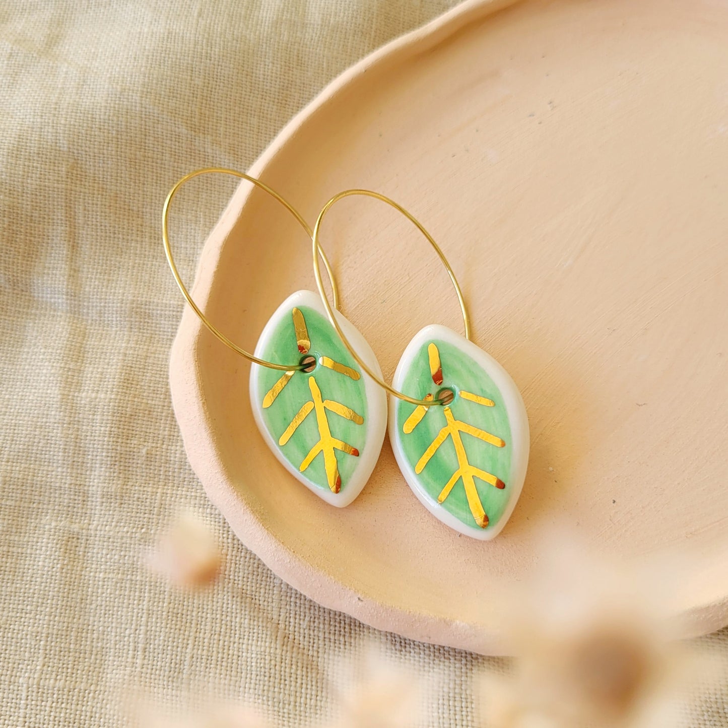 Porcelain dangle earrings with gold "Green and gold leaves"