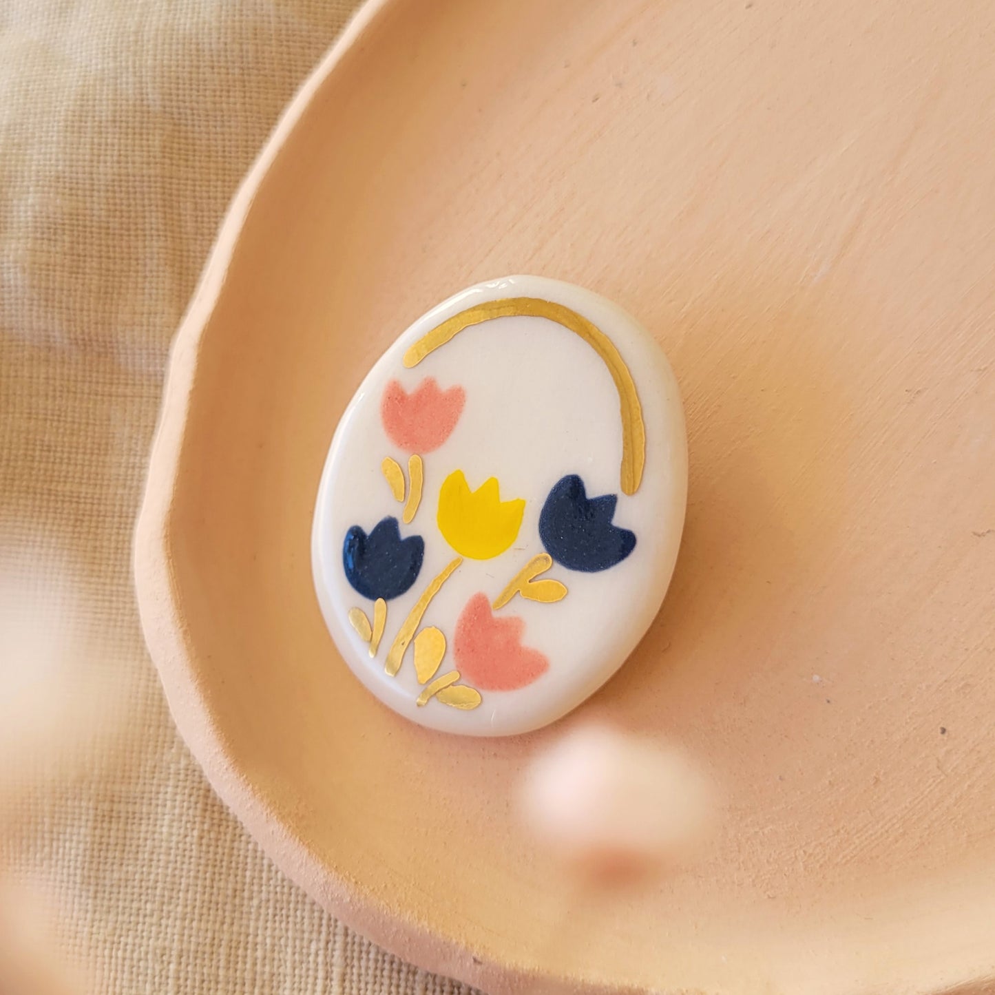 Porcelain brooch with gold "Tulips"
