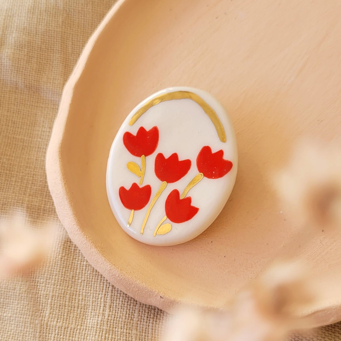 Porcelain brooch with gold "Red tulips"