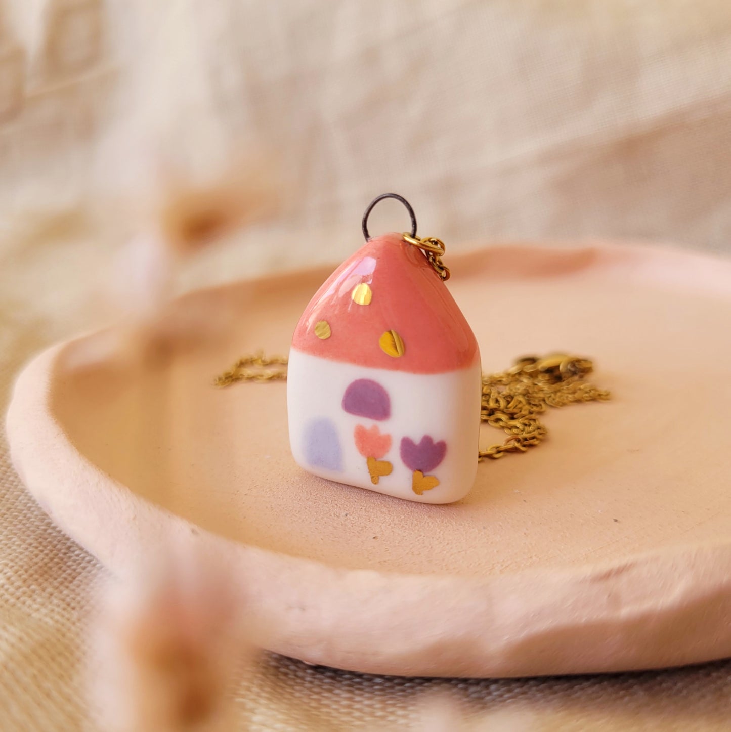Porcelain necklace with gold "Pink house"