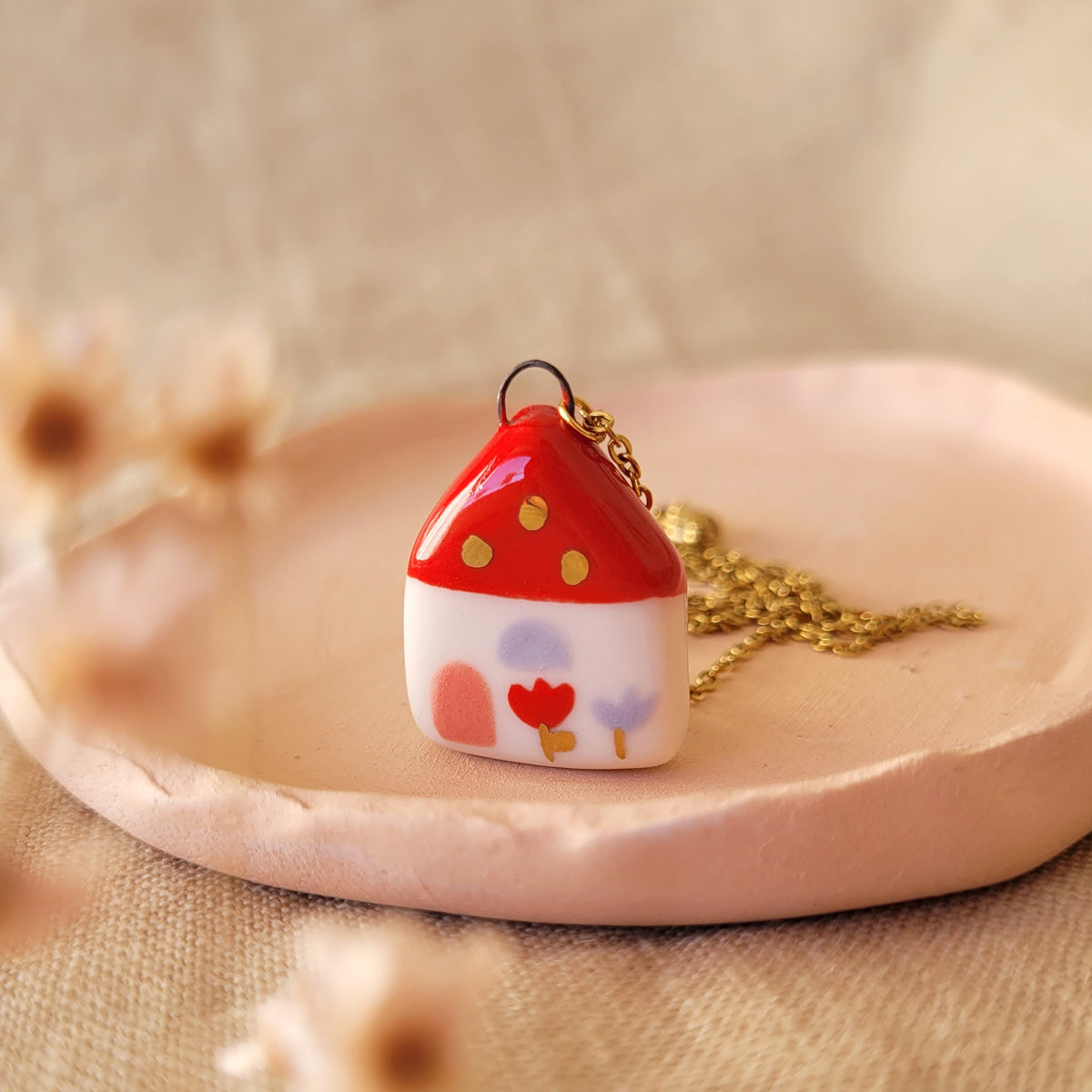 Porcelain necklace with gold "Red house with pink door"