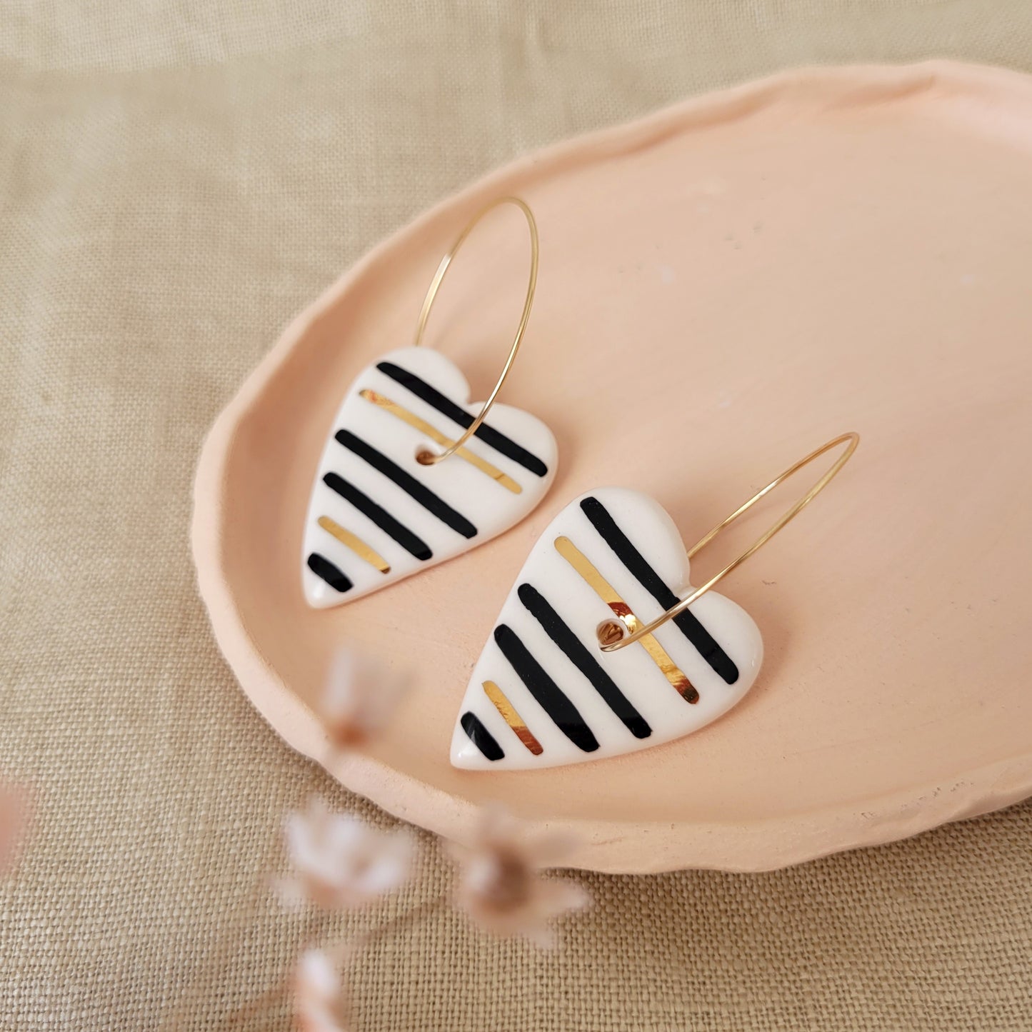 Porcelain dangle earrings with gold "Hearts with stripes"