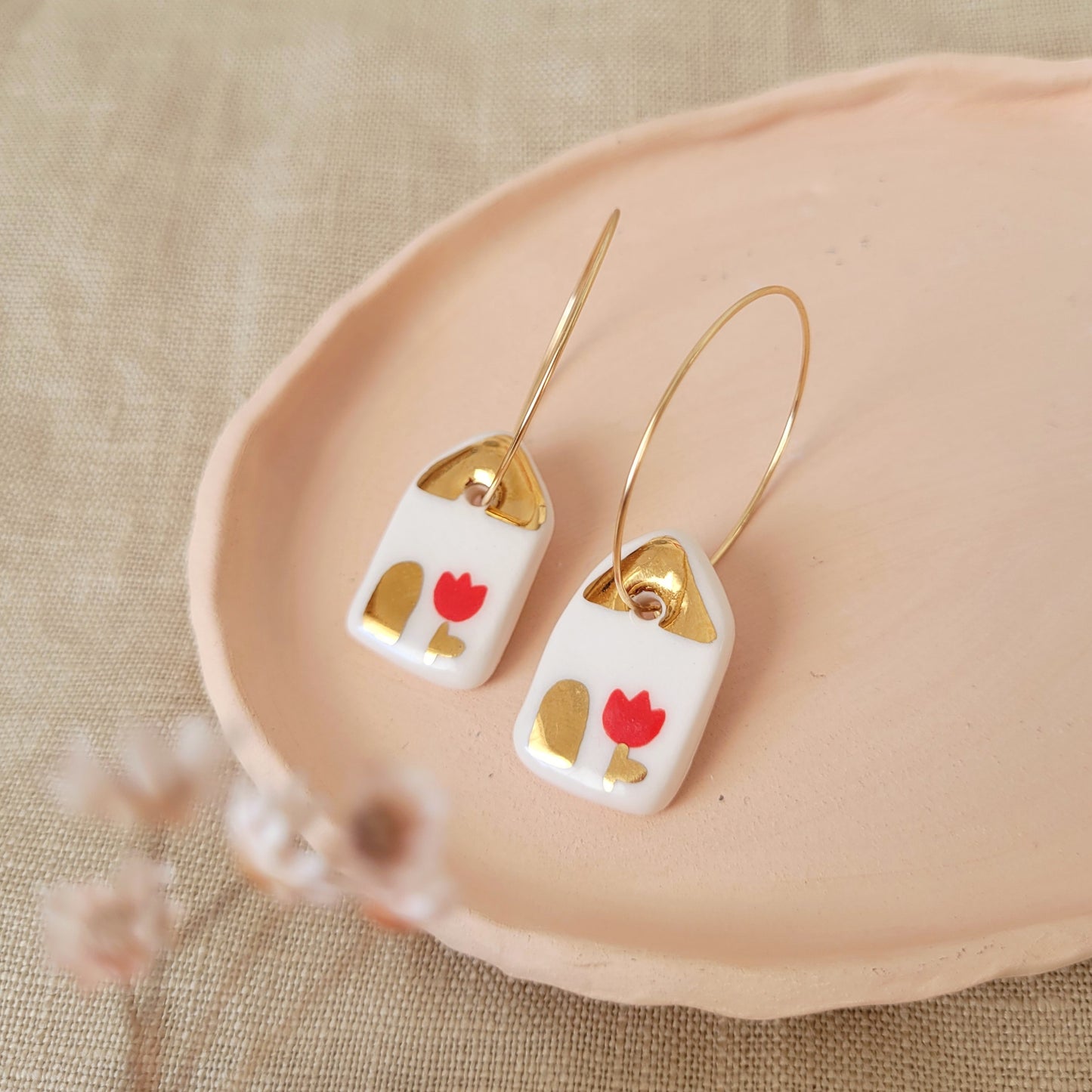 Porcelain dangle earrings with gold "Houses with red tulips"