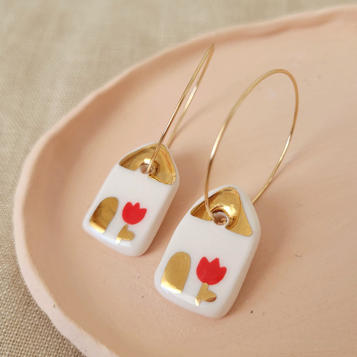 Porcelain dangle earrings with gold "Houses with red tulips"