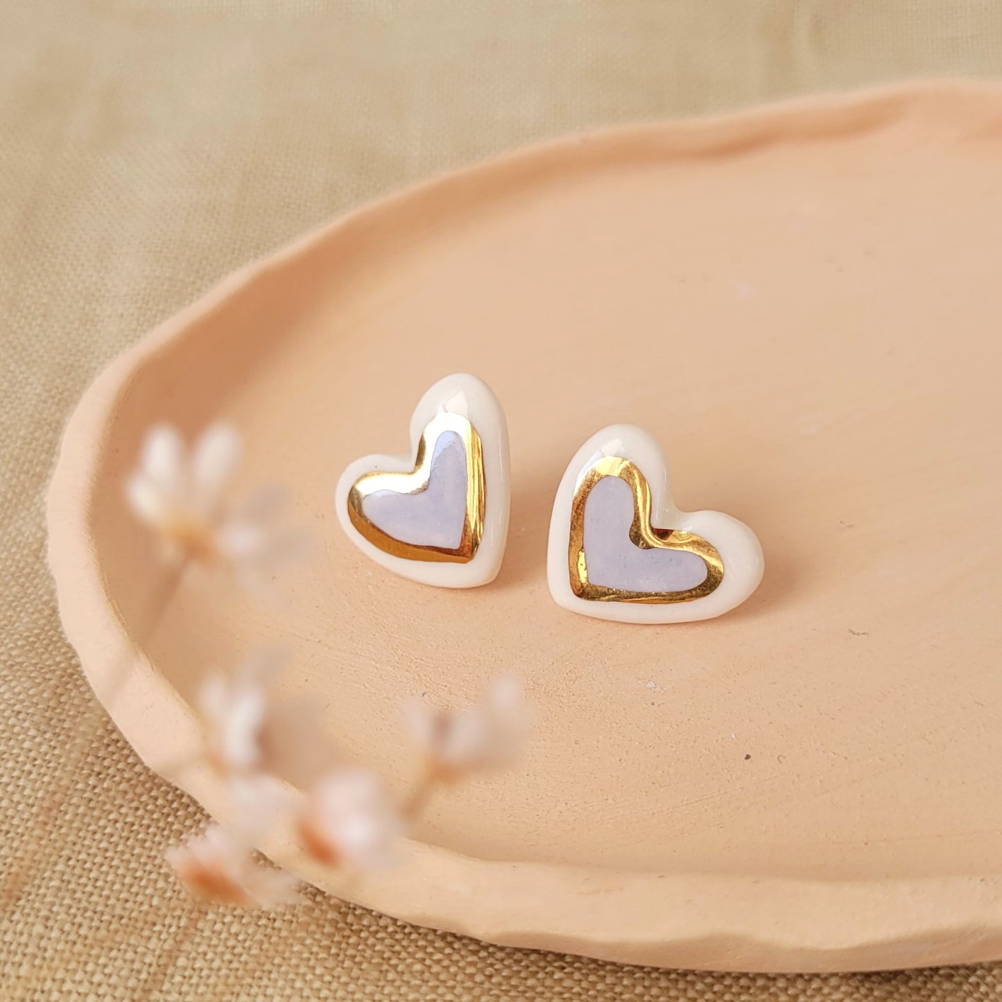 Porcelain stud earrings with gold "Light purple hearts with gold"