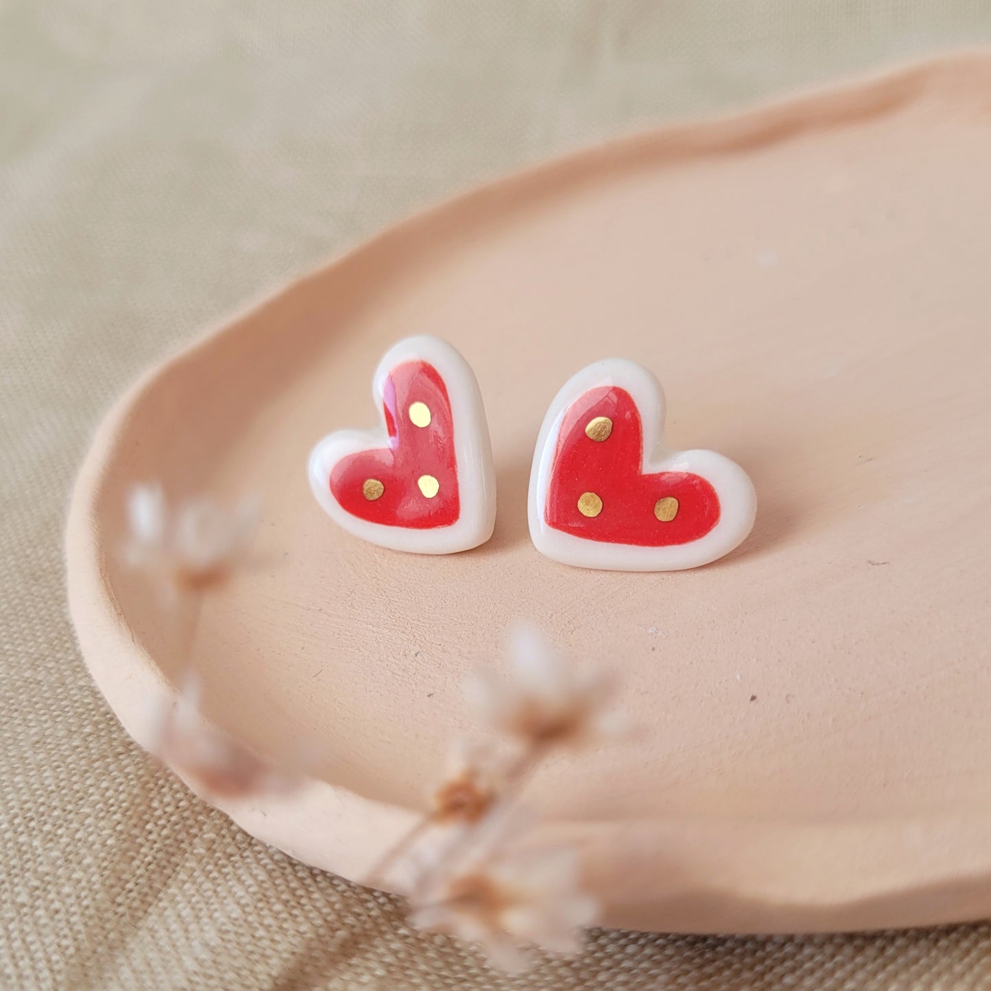 Porcelain stud earrings with gold "Red hearts with dots"