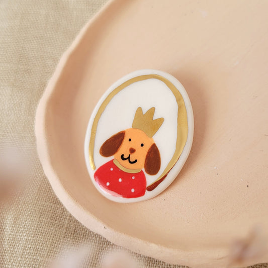 Porcelain brooch with gold "Peter"