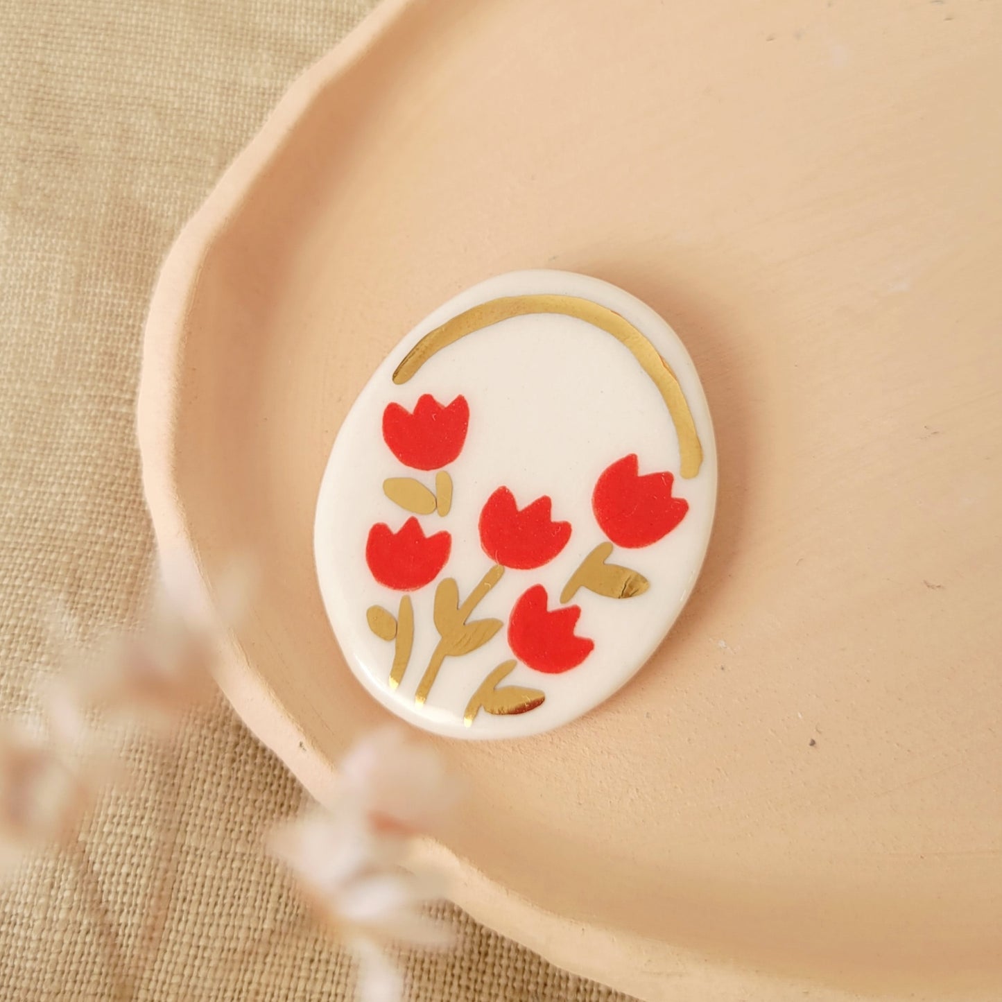 Porcelain brooch with gold "Red tulips"