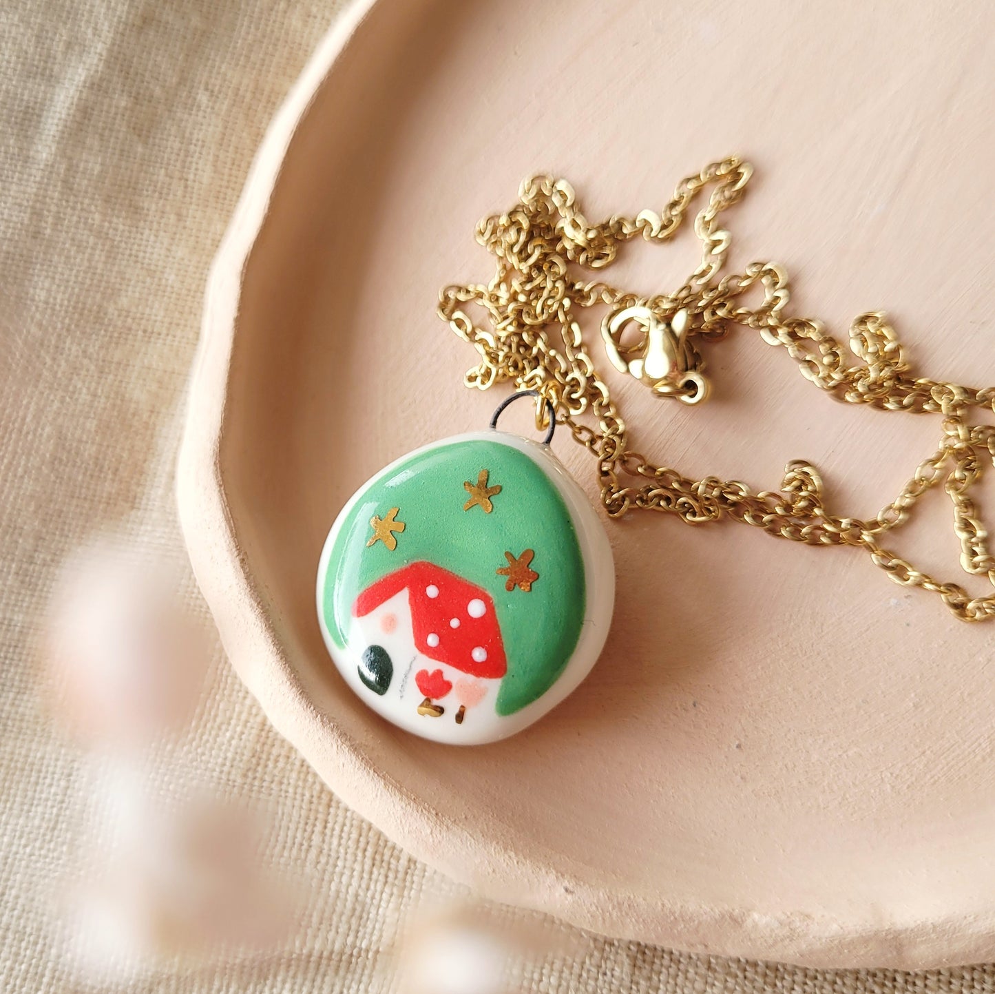 Porcelain necklace with gold "Red house in green"