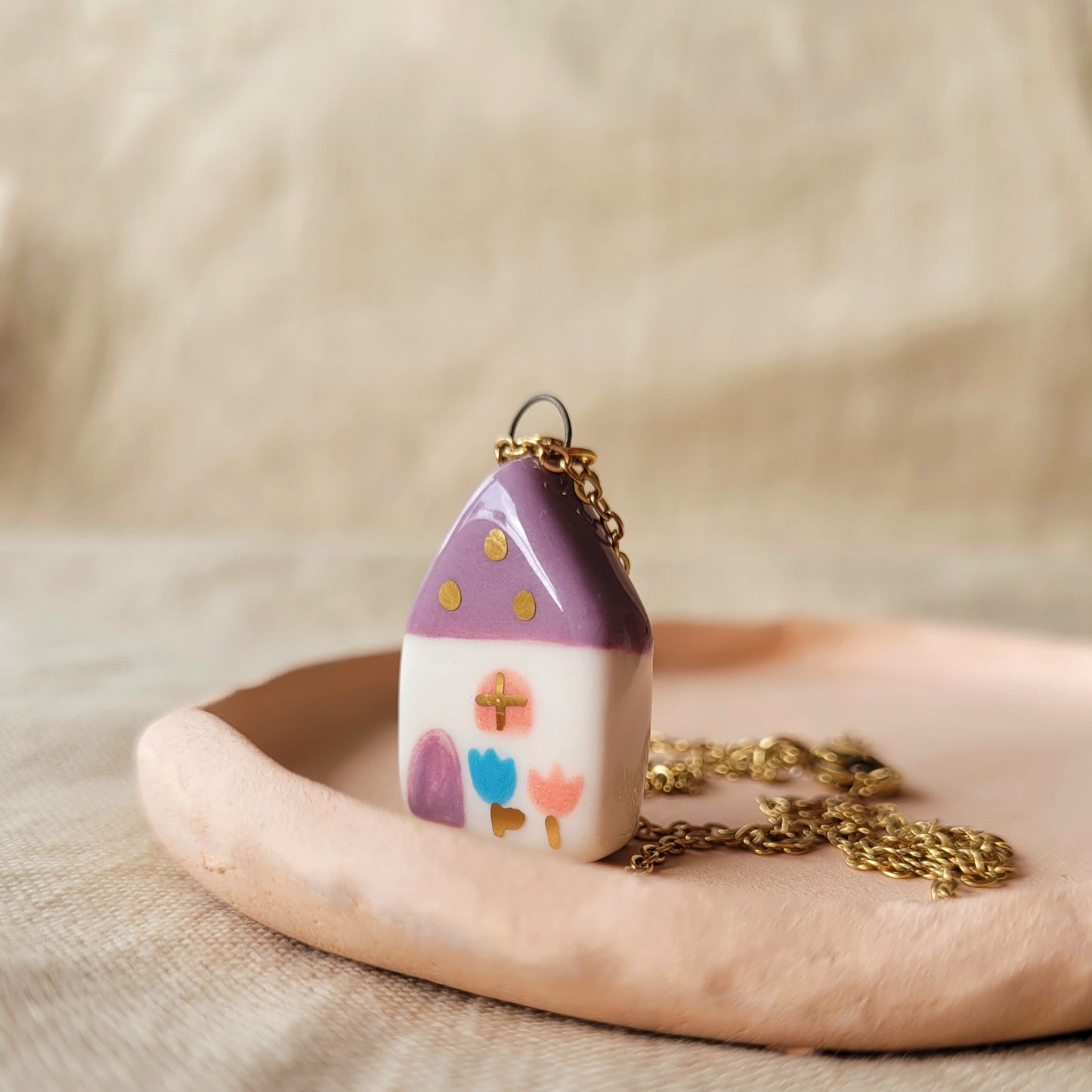 Porcelain necklace with gold "Dark pink house"