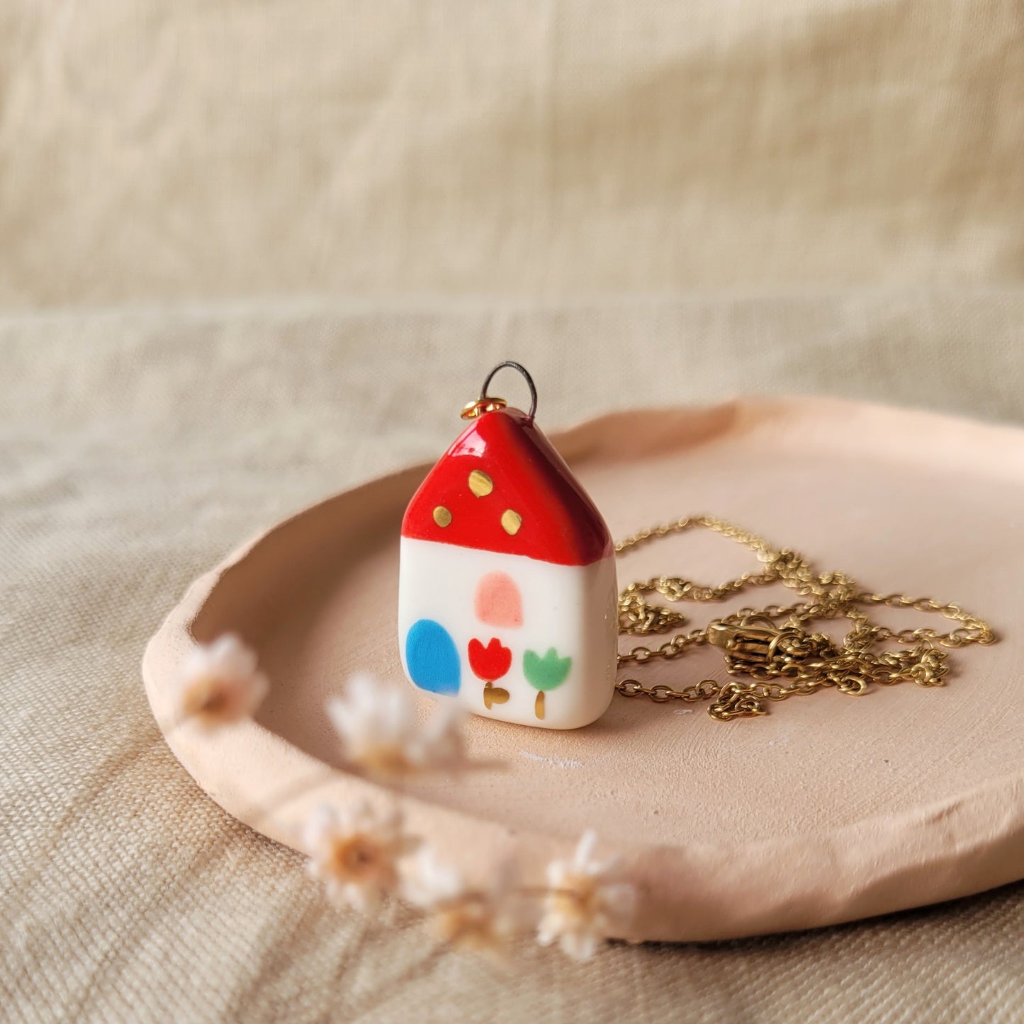 Porcelain necklace with gold "Red house with green tulip"