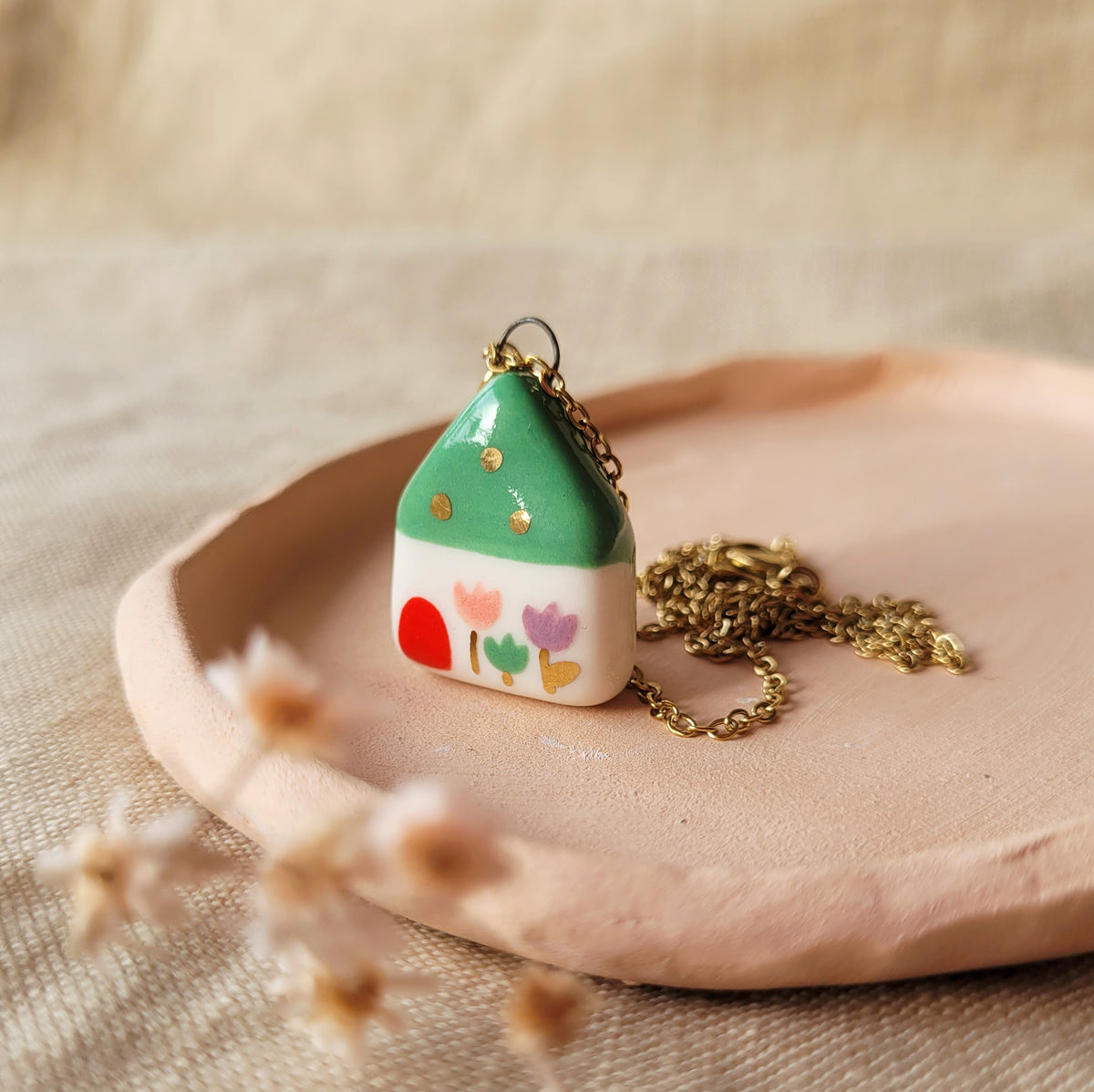 Porcelain necklace with gold "Green house with tulips"