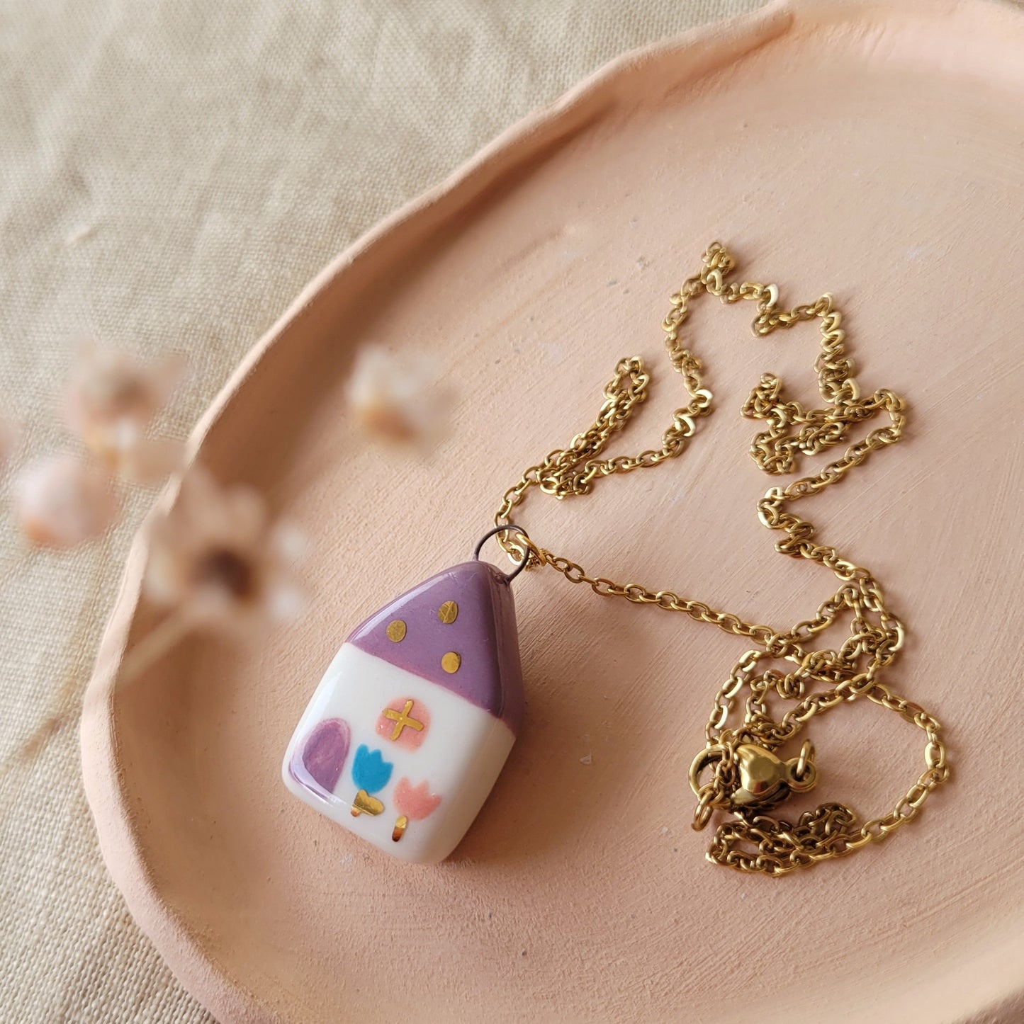 Porcelain necklace with gold "Dark pink house"