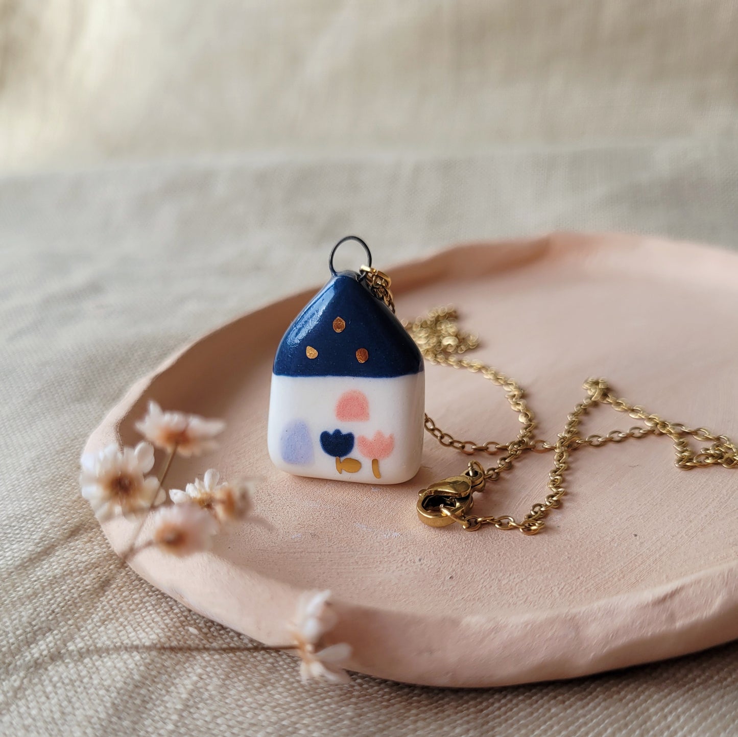 Porcelain necklace with gold "Dark blue house"