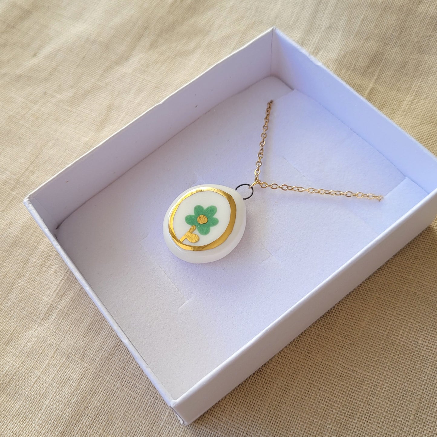 Porcelain necklace with gold "Green flower"