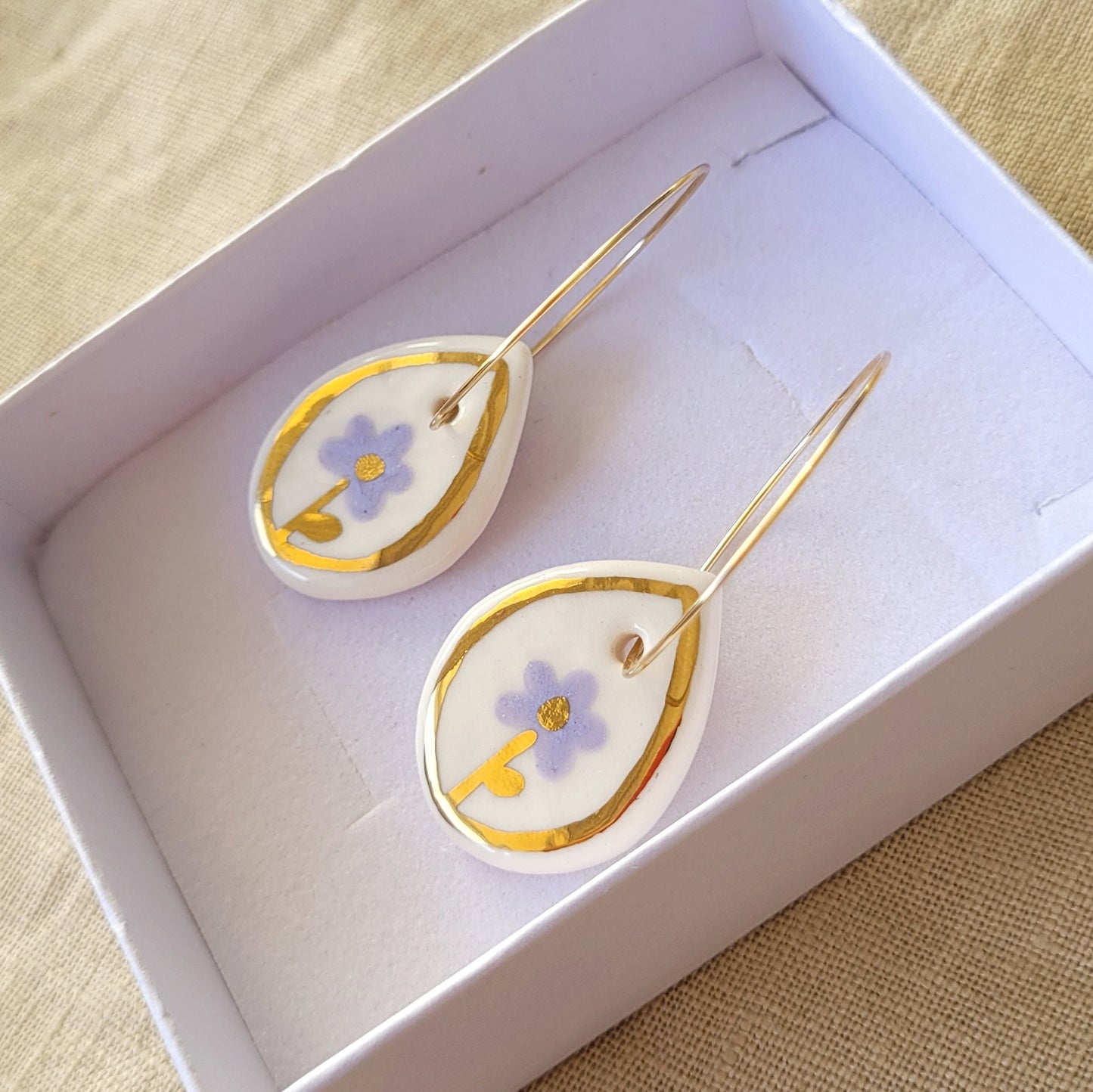 Porcelain dangle earrings with gold "Purple flowers"
