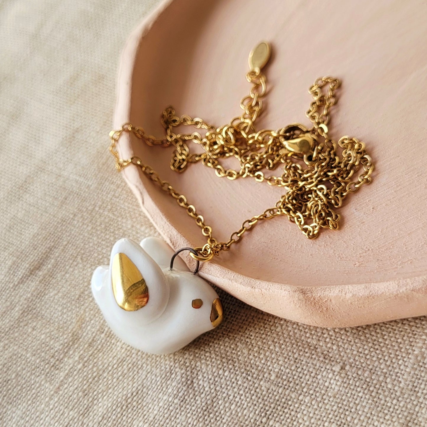 Porcelain necklace with gold "Little bird"