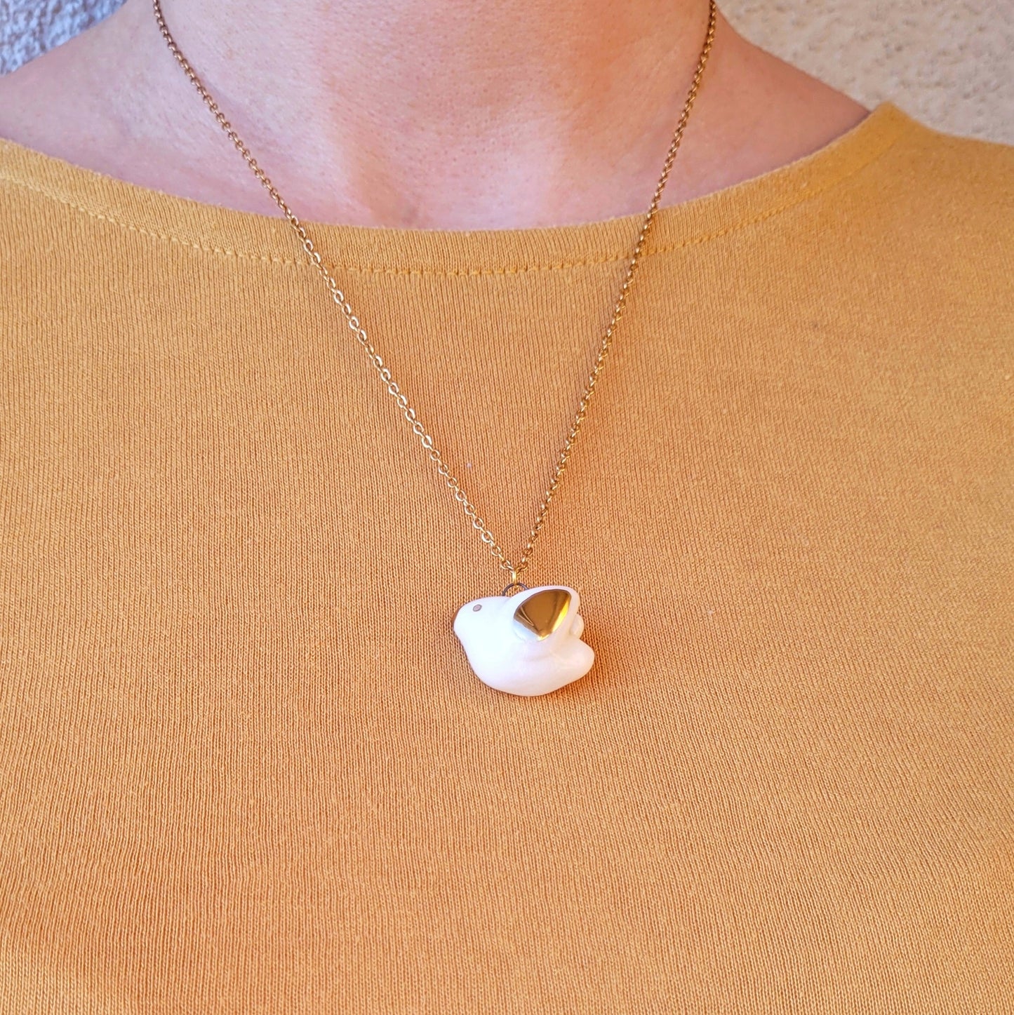 Porcelain necklace with gold "Little bird"
