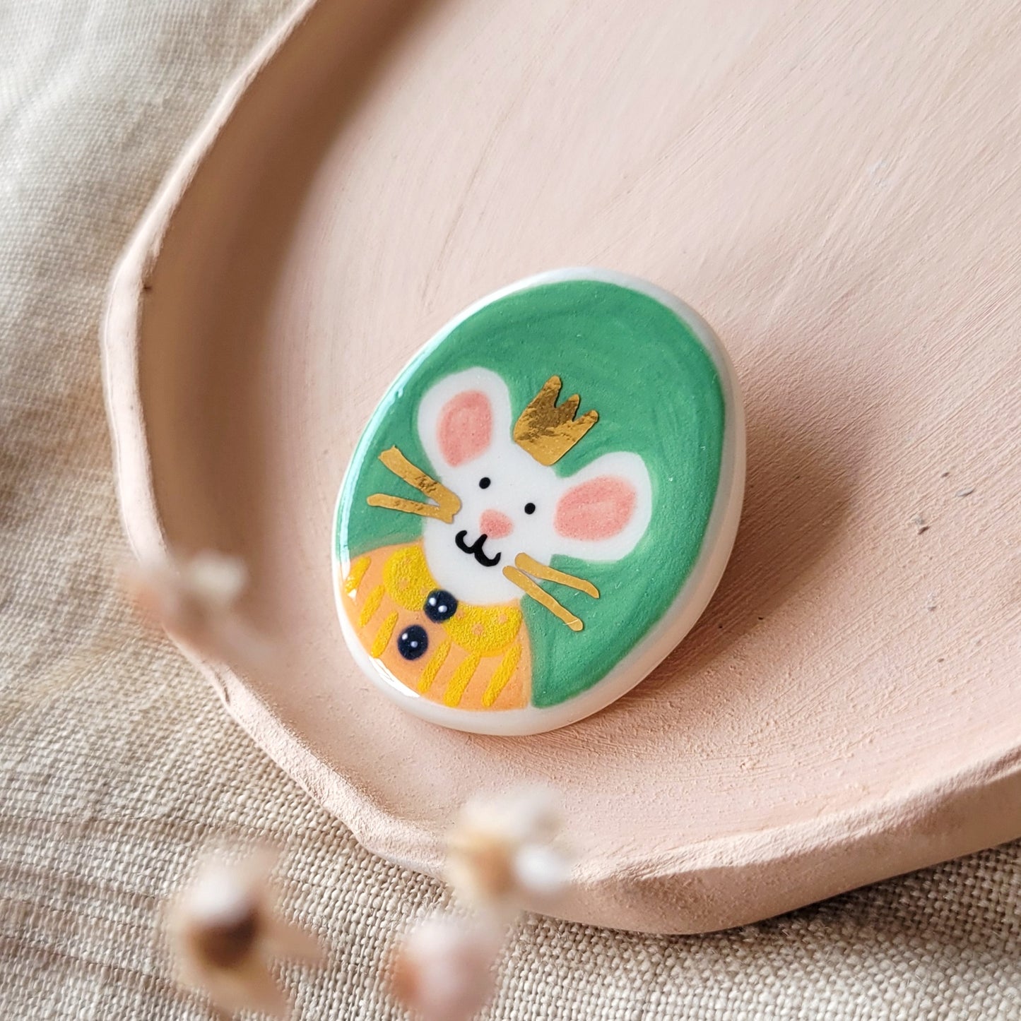 Porcelain brooch with gold "Gregory"