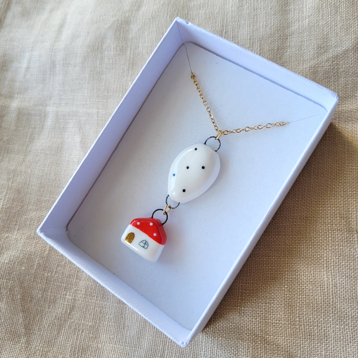 Porcelain necklace with gold "Red house and a balloon"