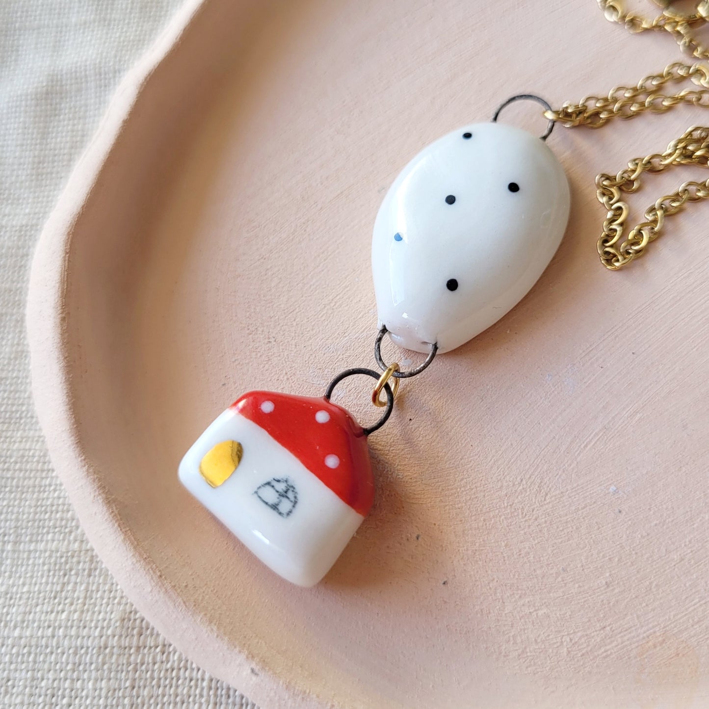 Porcelain necklace with gold "Red house and a balloon"