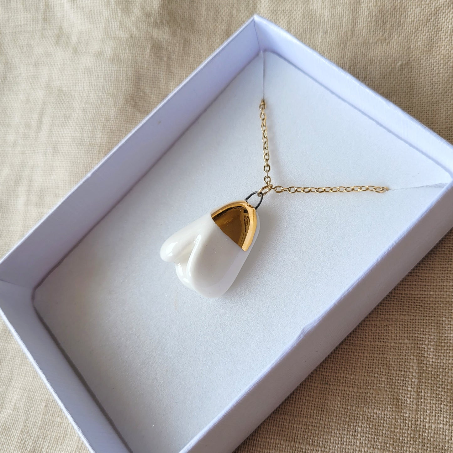 Porcelain necklace with gold "Snowdrop"