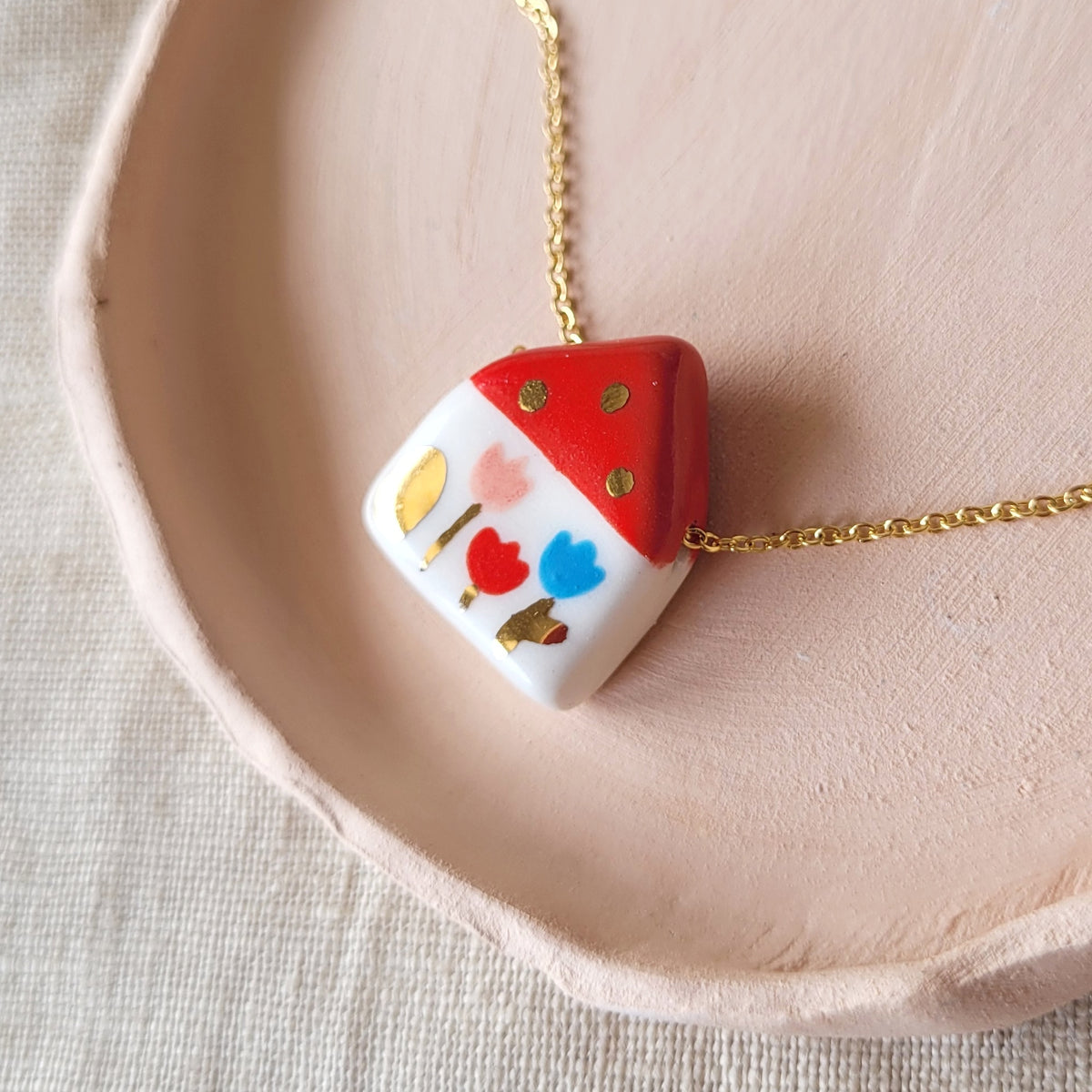 Porcelain necklace with gold "Red house with tulips"