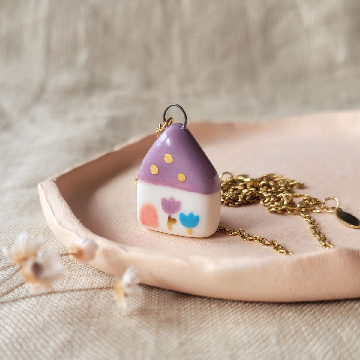 Porcelain necklace with gold "Dark pink house"
