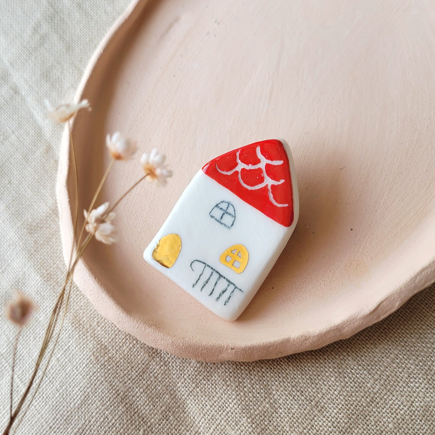 Porcelain brooch with gold "Little house"
