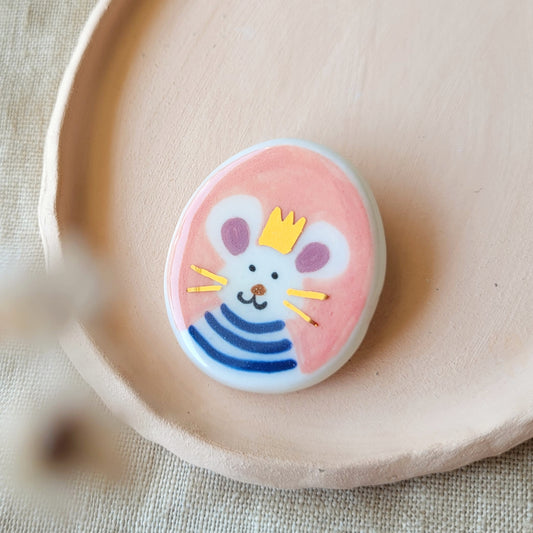 Porcelain brooch with gold "Joseph"