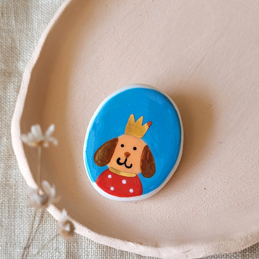 Porcelain brooch with gold "Hugo"