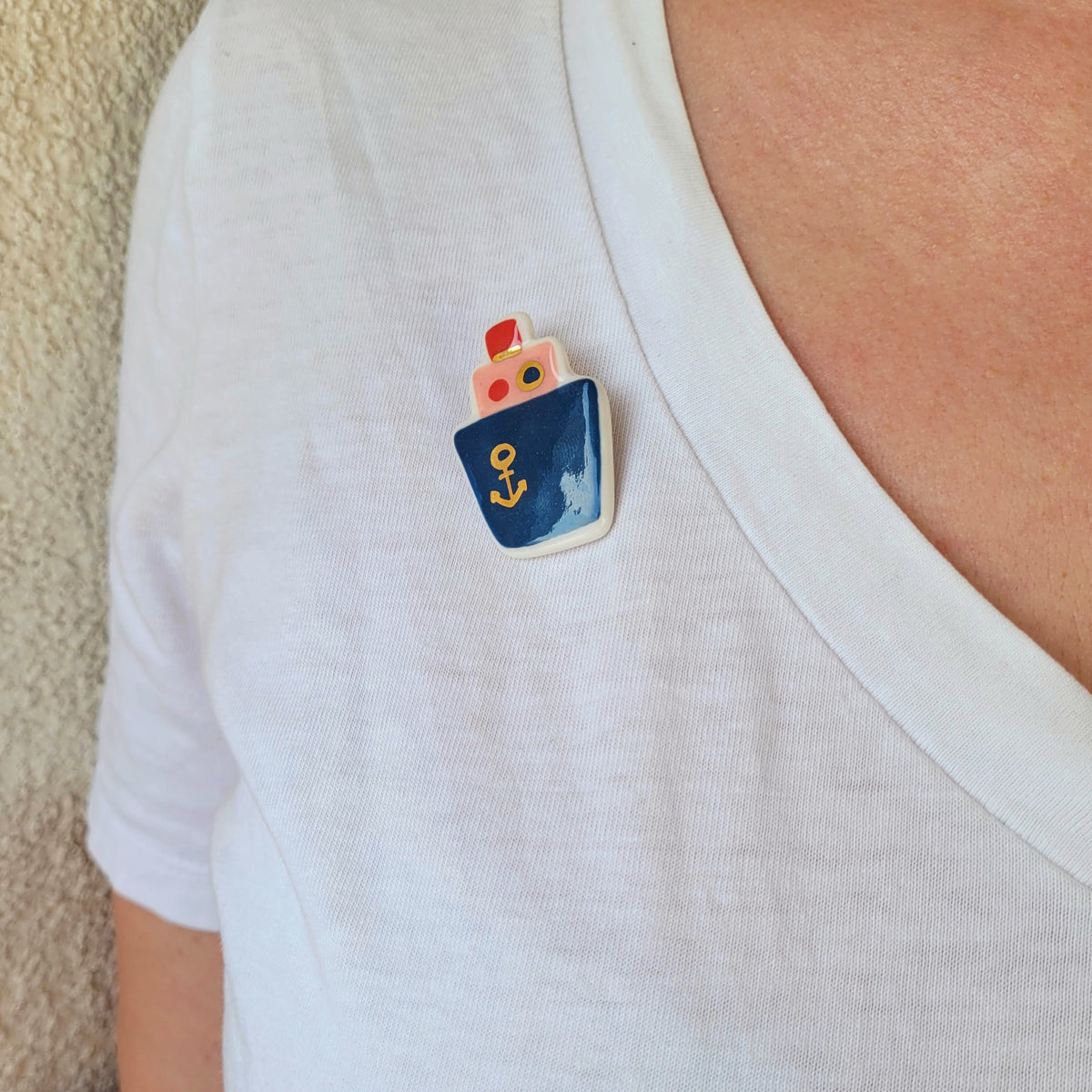 Porcelain brooch with gold "Dark blue boat"