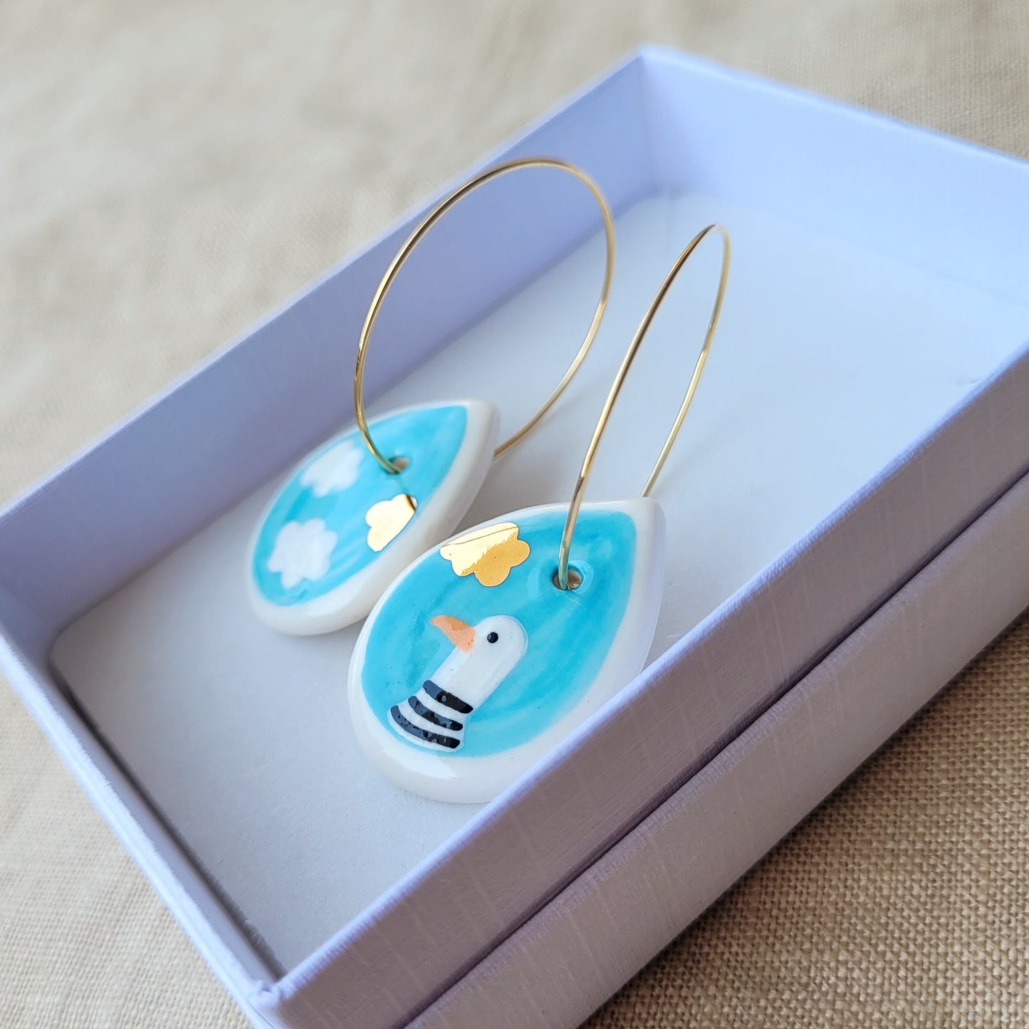 Porcelain dangle earrings with gold "Seagull"