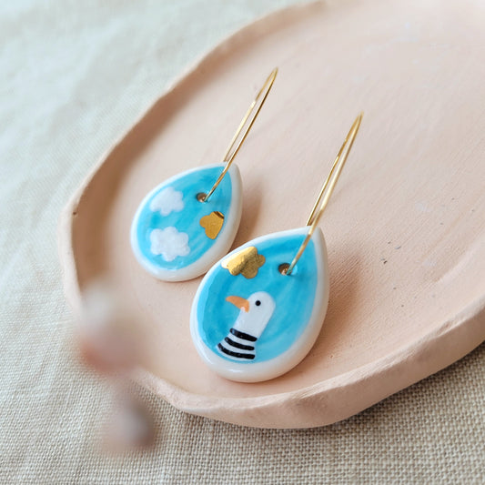 Porcelain dangle earrings with gold "Seagull"