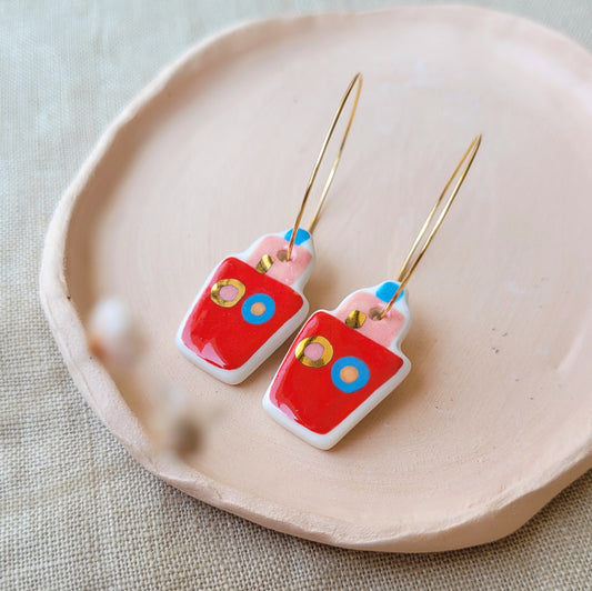 Porcelain dangle earrings with gold "Little red boats"