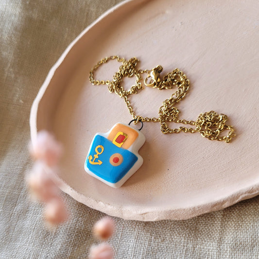 Porcelain necklace with gold "Blue boat"