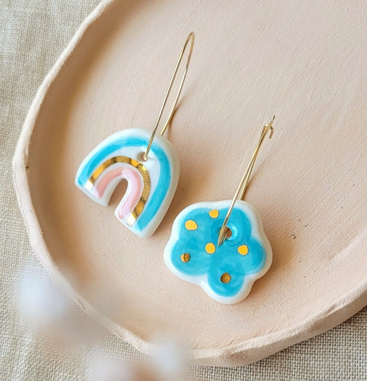 Porcelain dangle earrings with gold "Light blue cloud and rainbow with pink"