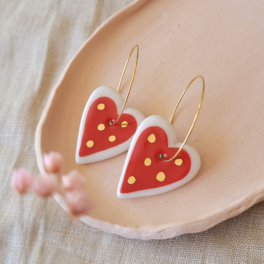 Porcelain dangle earrings with gold "Red hearts"