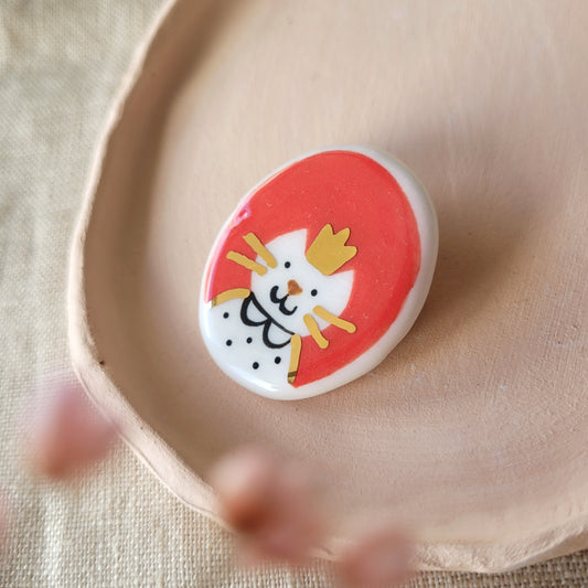 Porcelain brooch with gold "Catherine"