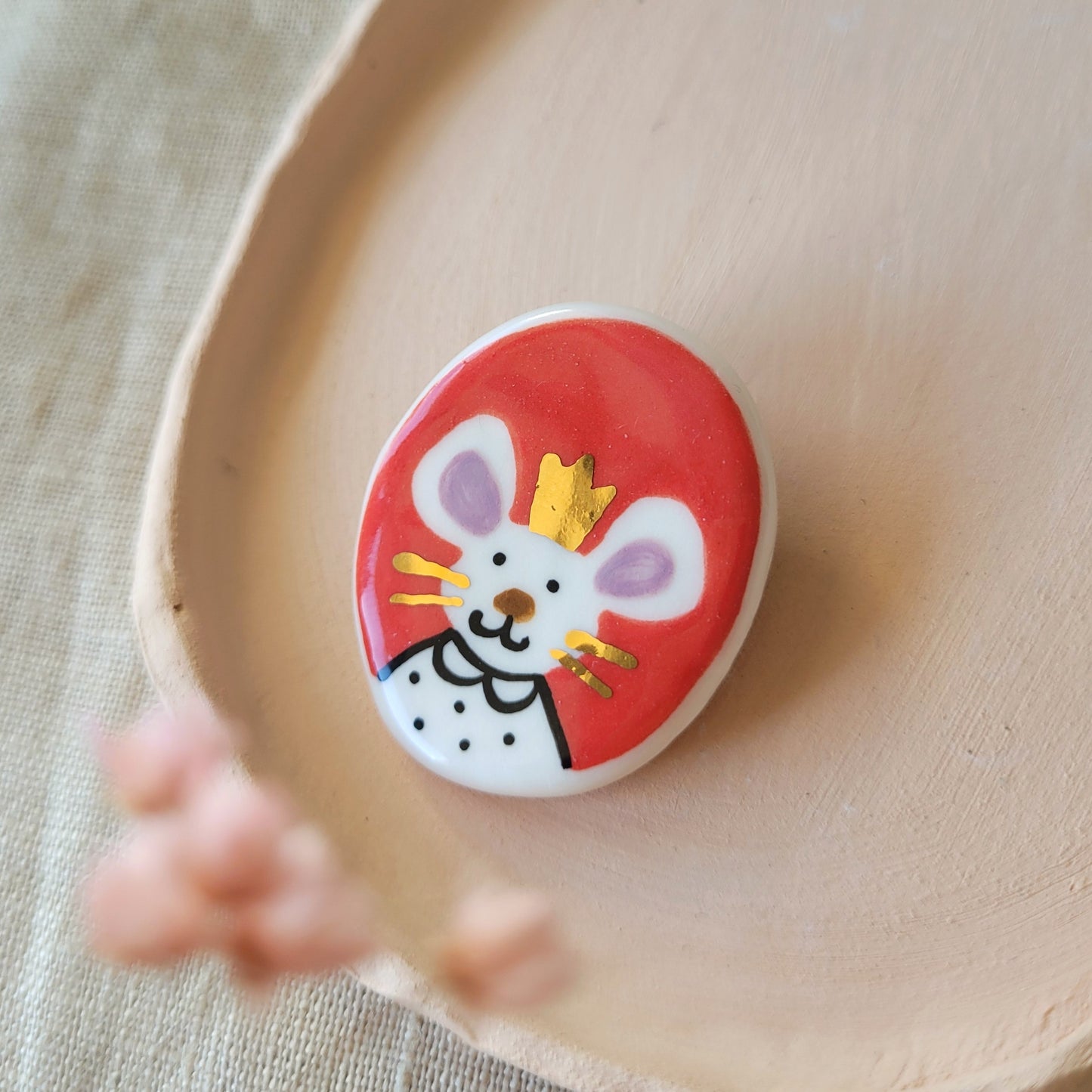 Porcelain brooch with gold "Lucio"