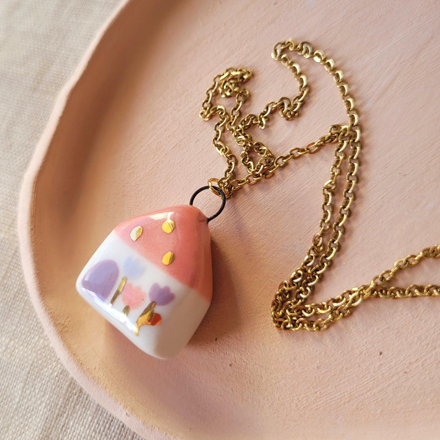 Porcelain necklace with gold "Pink house"