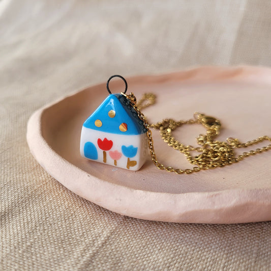 Porcelain necklace with gold "Blue house"